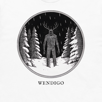 Wendigo engraved cryptid t-shirt — crosshatch medallion design close-up