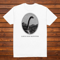 Loch Ness Monster engraved cryptid t-shirt — black and white crosshatch medallion design on white tee, flat lay