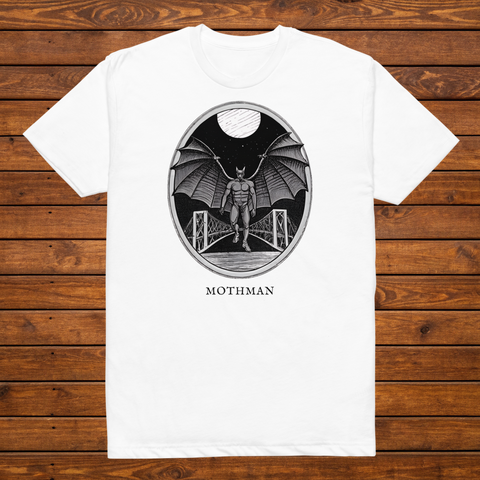 Mothman engraved cryptid t-shirt — black and white crosshatch medallion design on white tee, flat lay
