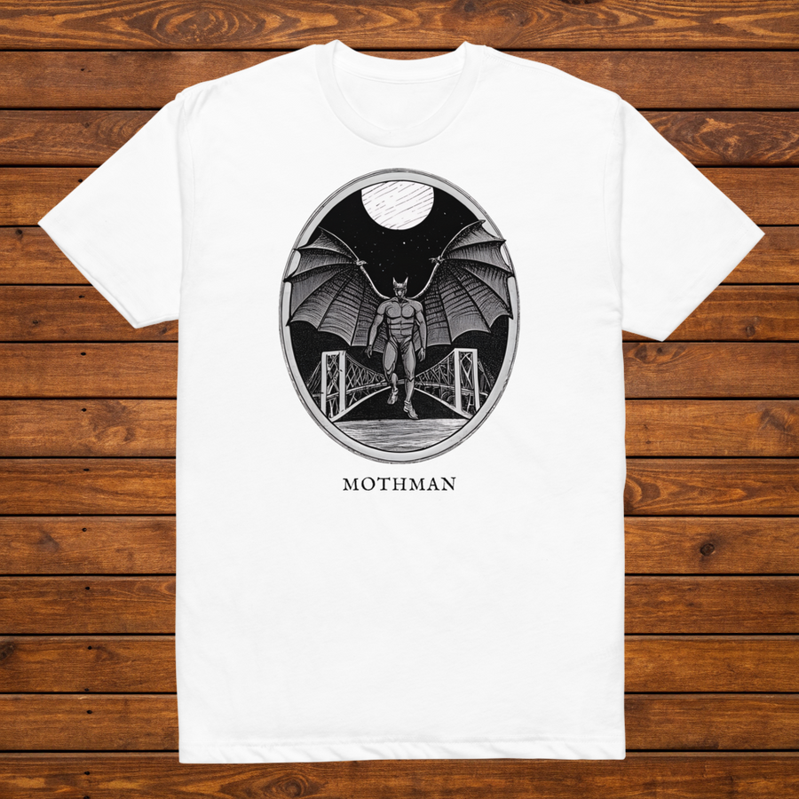 Mothman engraved cryptid t-shirt — black and white crosshatch medallion design on white tee, flat lay