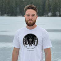 Model wearing the Wendigo engraved cryptid t-shirt outdoors