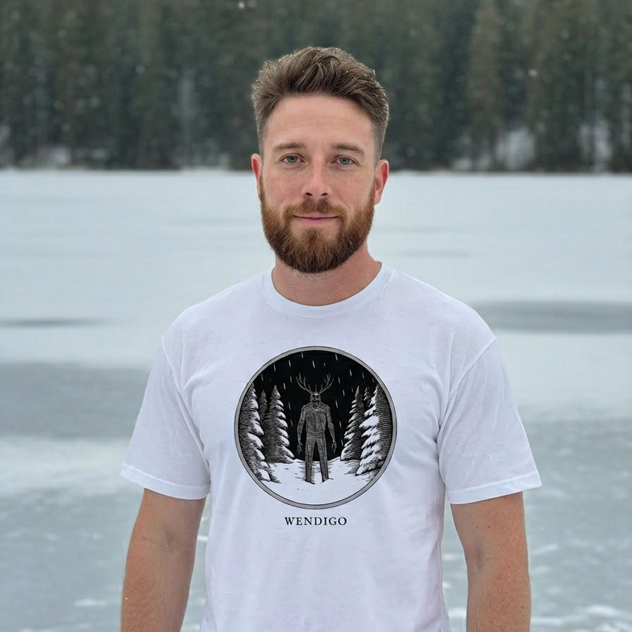 Model wearing the Wendigo engraved cryptid t-shirt outdoors