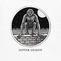 Dover Demon engraved cryptid t-shirt — crosshatch medallion design close-up