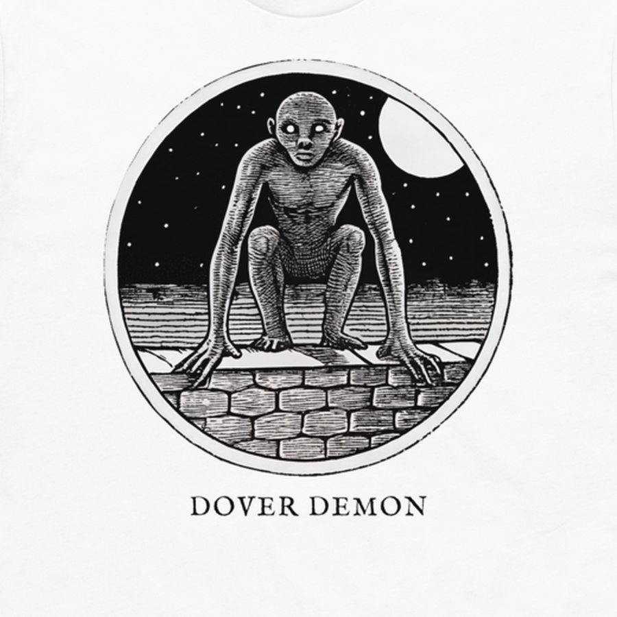 Dover Demon engraved cryptid t-shirt — crosshatch medallion design close-up